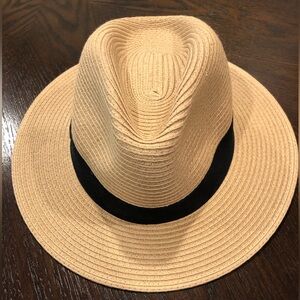 Tan fedora with wide black band